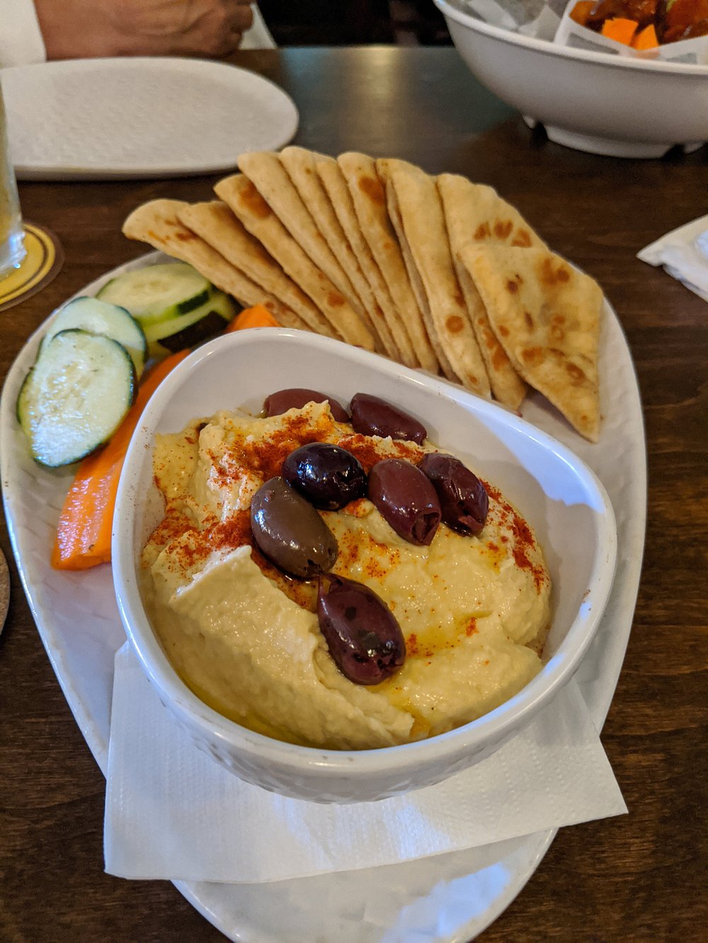 a-plate-of-hummus-and